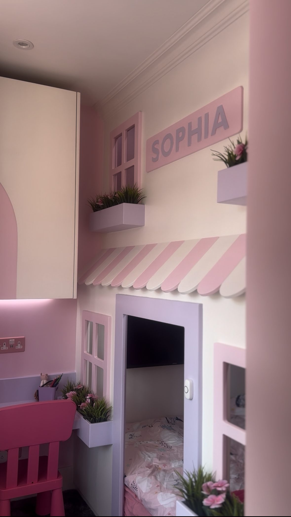 Child's bedroom with a handmade shopfront play area built by VIP Walls