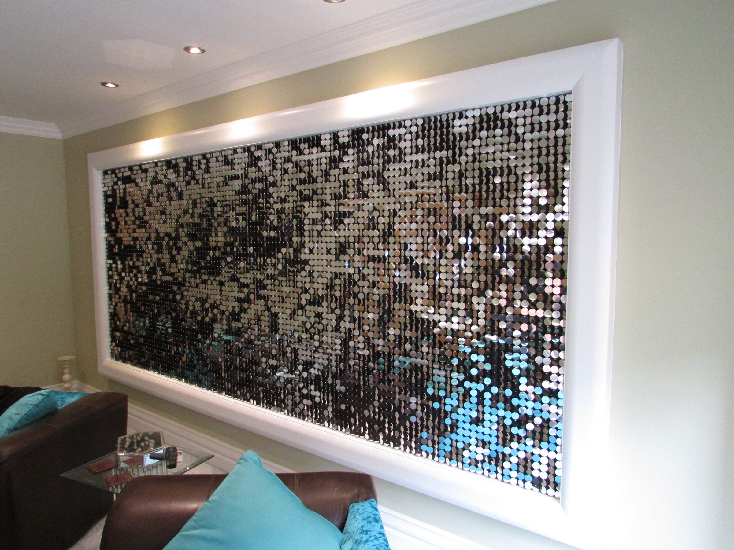 Lit sequin feature wall behind a seating area